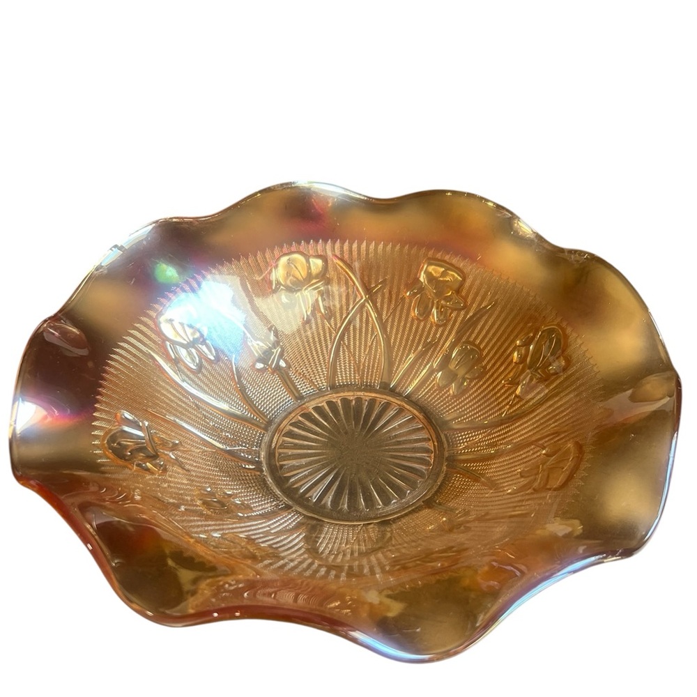 Vintage Jeanette Iris & Herringbone Carnival Glass bowl with a ruffled edge